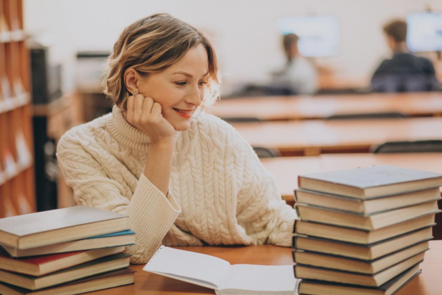 Student analyzing financial reports during practical session